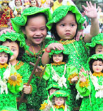 Girls dressed as child Jesus join a religious procession on the eve of Santo Nino Festival in Manila on Saturday. Reuters