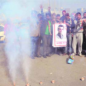 Celebration Time: Congress workers burst crackers to welcome the elevation of Rahul Gandhi as party vice-president at Amritsar on Sunday
