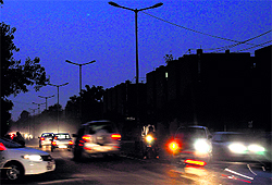 Non-functional streetlights at the road dividing Phase 7, Mohali, and Sector 52, Chandigarh, on Sunday