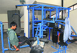 The gym at the Sports Complex, Sector 46, is yet to be upgraded; and (right) a hi-tech gymnasium at the Sports Complex, Sector 42, in Chandigarh