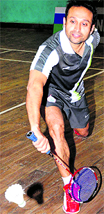 Haroon Rashid in action during a badminton match at Sector 42 in Chandigarh on Sunday
