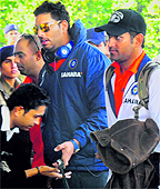 Skipper MS Dhoni and Yuvraj Singh arrive at the hotel in Chandigarh on Sunday for the fourth India-England ODI to be played in Mohali on January 23