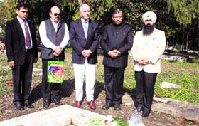 Australian Senator Eric Abetz, who is the leader of the opposition in the Australian Senate and former forest minister of Australia, at the grave of his grandfather in Dehradun on Sunday.