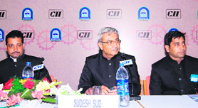 Sudesh Sud (centre) of Delphi TVS during the buyer-seller meet at the Industrial Expo in Haridwar on Sunday.