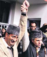 Omar Abdullah with Nasir Aslam Wani at a rally in Srinagar on Sunday.