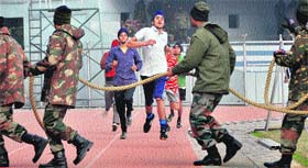 Candidates go through a physical test for recruitment in the Army in Ludhaina.