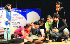 Students enact a scene from the play Aaj Ka Sach on the concluding day of the Chandigarh Traffic Week at the Tagore Theatre in Chandigarh on Monday.