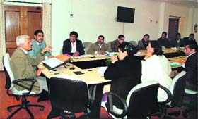 Ashok Pai, Principal Secretary to the Uttarakhand Governor, presides over a preparatory meeting on Monday in connection with "Basantotsav flower festival" to be held at Raj Bhavan, Dehradun