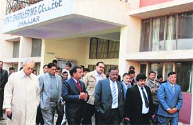 Financial Commissioner Dhanpat Singh inspects the site for a porposed government engineering college in Jhajjar.