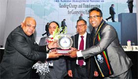Prof LN Mittal (first from left), Director, Quality Improvement Programme of the Geeta Institute of Management and Technology, Kanipla, receives an award from Dr C Raj Kumar (first from right), Vice-Chancellor, Jindal Global University, New Delhi, at the 14th National Management Summit in New Delhi.