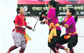 Artistes exhibit their skills at a function in Gurgaon.