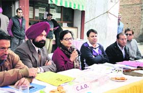 Additional Chief Administrator Sarojini Gautam Sharda chairs the auction of sites conducted by PUDA