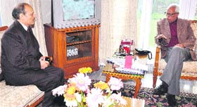 Governor NN Vohra with Principal Secretary, Home, Suresh Kumar in Jammu on Monday