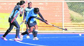 Players in action during a semifinal match of the 16th All-India MPS Grewal Women's Hockey Tournament at the PAU in Ludhiana on Monday