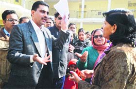 Parents gather outside MGM School, Chandigarh Road, to protest against the closure of the school