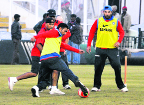 Skipper MS Dhoni, Yuvraj Singh and teammates play soccer.