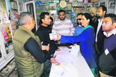 Chief Parliamentary Secretary Dr Navjot Kaur Sidhu along with a health team during a raid on chemist stores on the Airport road in Amritsar on Tuesday. 