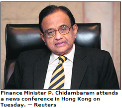 Finance Minister P. Chidambaram attends a news conference in Hong Kong on Tuesday.