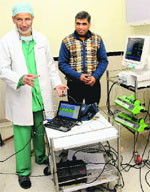 Dr GD Puri, Head, Anaesthesia Department, PGI, gives a demonstration regarding the functioning of the robot in Chandigarh. Tribune photo Manoj Mahajan 