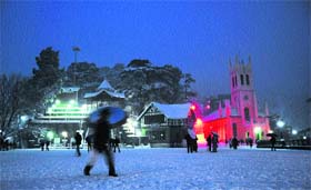 A night view of the historical Ridge after snowfall in Shimla