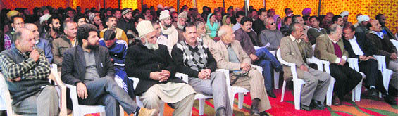 Sarpanches and panches of Reasi district take part in a meeting with police officers on Tuesday. 