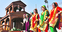 Artistes during the press preview of the J-K tableaux for the Repbulic Day parade in New Delhi on Tuesday