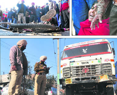 The damaged cycle of the victims; a wailing relative of the deceased and the police impounds the truck that crushed the mother-son duo at Samrala Chowk on Tuesday.