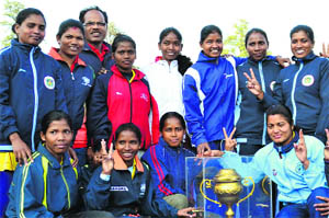 Players of South Eastern Railway, Kolkata, with the winning trophy at the 16th All-India MPS Grewal Memorial Hockey Tournament at the  PAU, Ludhiana, on Tuesday. 