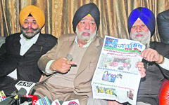 DSGMC president Paramjit Singh Sarna (centre) at a press conference in New Delhi on Tuesday.