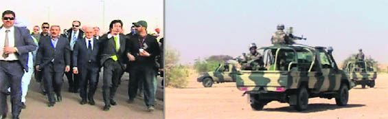 (Above left) A delegation of Algerian and Japanese officials visit the Tiguentourine Gas Plant, 50 km from In Amenas; (right) Algerian soldiers patrol in the desert at an undisclosed location