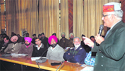 Brig BK Nanda (retd), a resource person of the National Disaster Management Authority, addresses officials of the police, paramilitary forces and district administration during a seminar on disaster management in Jalandhar on Wednesday