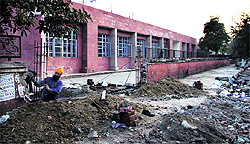 A wall of the tehsil complex has been broken to install a gate of the newly constructed Bharat Ratna Dr BR Ambedkar Bhawan in Jalandhar on Tuesday
