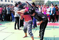 Students of BD Arya Girls College take training in self-defence in Jalandhar Cantonment on Wednesday