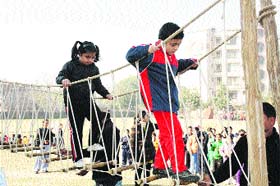 Not an easy ride this: Students of Bal Bharti School during an adventure camp in Ludhiana