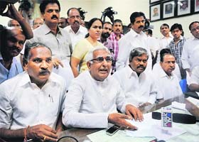 Karnataka ministers CM Udasi (2nd from left) and Shobha Karandlaje (in sari), along with some BJP MLAs, interact with the media at the Vidhana Soudha in Bangalore on Wednesday