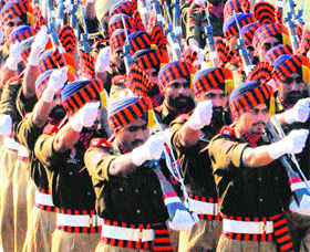 Punjab Police personnel rehearse for the Republic Day parade at Guru Nanak Stadium in Amritsar on Thursday. 