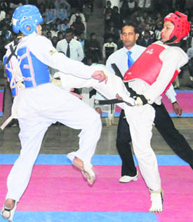 Players in action during the All-India Inter-University Tae Kwon Do Championship at Panjab University in Chandigarh on Thursday . 
