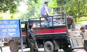 Court files being loaded on a vehicle of the Chandigarh Police from the Sector 17 District Courts to be shifted to the new building in Sector 43 on Thursday. 