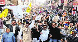 BJP-HJC members protest over Union Home Member Sushil Kumar Shindes remarks against the RSS and the saffron party in Karnal on Thursday