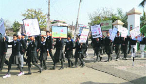 Students participate in an awareness rally against social evils in Ambala Cantt. 
