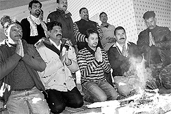 HPCA president Anurag Thakur (centre) and members offer their prayers at the Indrunag temple in Dharamsala on Thursday