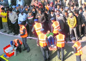 Jawans of the National Disaster Response Force rescue a victim from an earthquake-affected building during a mock drill organised by the National Disaster Management Authority at Red Cross Market in Jalandhar on Thursday