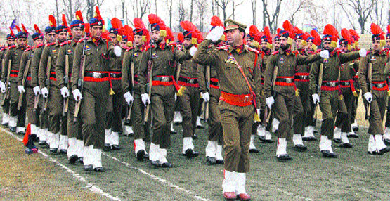 Police personnel take part in full dress rehearsal for the Republic Day parade in Srinagar on Thursday. Tribune photo: Amin War