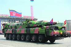 A military vehicle carrying what is believed to be a Taepodong-class missile Intermediary Range Ballistic Missile during a military parade in Pyongyang.