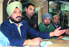 Congress councillor Gurinder Rishi addresses mediapersons in Amritsar on Friday.