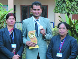 Vishavjit (middle), a student of LRS DAV Senior Secondary Model School in Abohar, shows the silver medal he won at the 33rd sub-junior national archery championship. A Tribune photograph