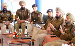 SSP Ravcharan Brar (extreme right) holds a meeting in connection with the security arrangements for the Republic Day function to be held at the Multi-purpose Sports Stadium, in Bathinda on Friday. Photo: Bhupinder Dhillon
