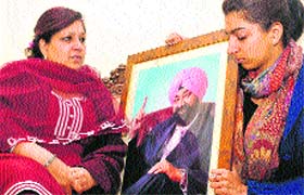 Savita Bhatti and her daughter turn nostalgic at their residence in Sector 19, Chandigarh, on Friday.