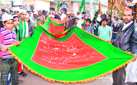 Devotees offer chadar at the Sabir Pak dargah in Roorkee on Friday.