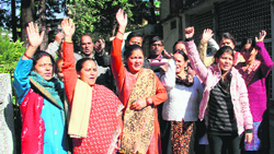 Residents of Ajabpur Khurd demonstrate against the installation of a mobile company tower in their area outside the District Magistrates office in Dehradun on Thursday.